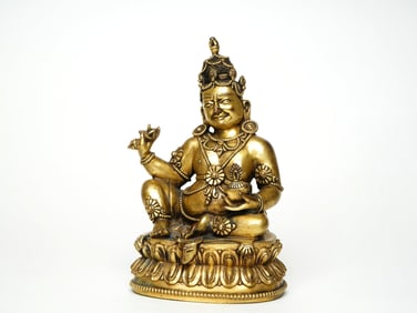 A GILT BRONZE FIGURE OF BUDDA