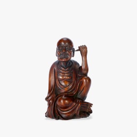 A BOX WOOD LUOHAN ORNAMENT