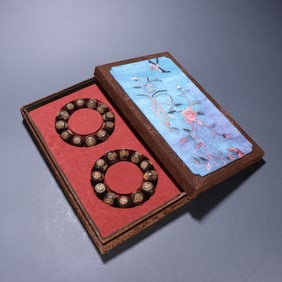 Pair of Agarwood Inlaid Gilt Bronze Carved Shou Pattern Bead Bracelet