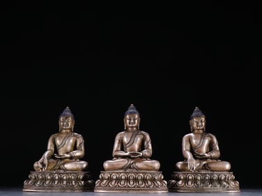 Group of Three Silver Buddha Figure