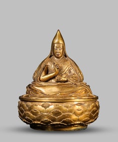 A Gilt-Bronze Lama Figure