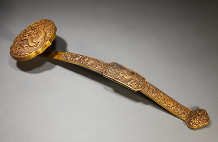 A Silver-Gilt 'Dragon and Phoenix' Ruyi Scepter