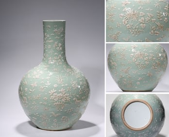 A Powder-Blue-Ground White-Relief 'Butterflies and Flowers' Globular Vase