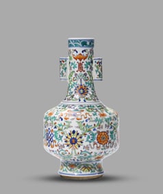A Doucai 'Floral Scroll and Eight Buddhist Emblems' Vase