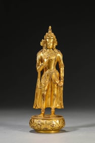 A Gilt-Bronze Standing Buddha