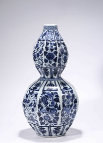 A Blue and White 'Eight Buddhist Emblems and Flowers' Vase