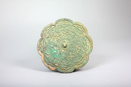 A MING INSCRIBED BRONZE MIRROR