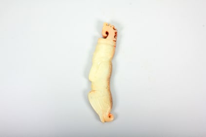 A HETIAN JADE FIGURINE