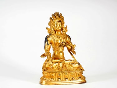 A GILT BRONZE FIGURE OF TARA