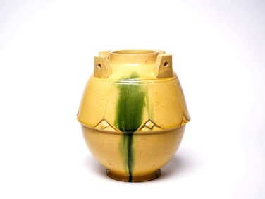 A XIANGZHOU YAO YELLOW GLAZED GREEN LOTUS JAR