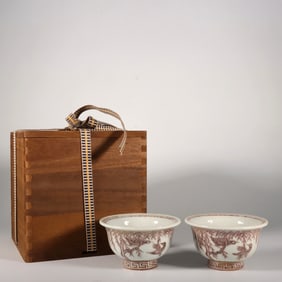 A PAIR OF RED 'BIRDS' GLAZED CUPS