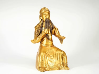 A GILT BRONZE FIGURE OF GUANGONG