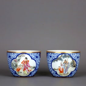 A BLUE AND WHITE FAMILLE ROSE 'FIGURAL CUP
