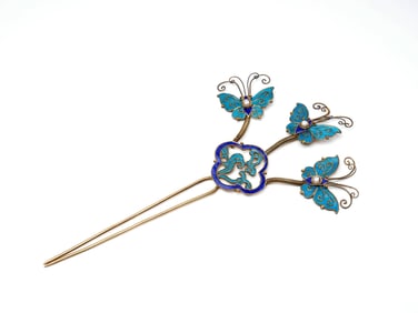 A GILT-SILVER HAIRPIN
