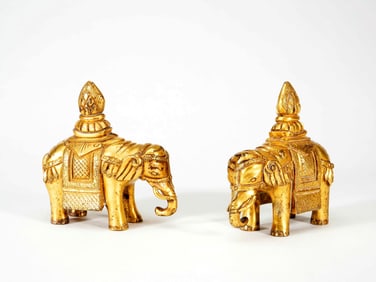 A PAIR OF GILT BRONZE ELEPHANTS