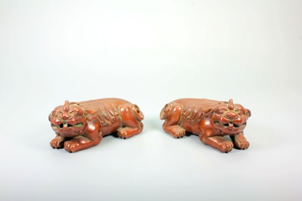 A PAIR OF 'LION'PAPER WEIGHT
