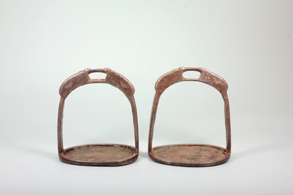 A PAIR OF IRON-SILVER INLAID STIRRUPS