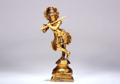 A GILT BRONZE FIGURE OF SEATED BUDDA