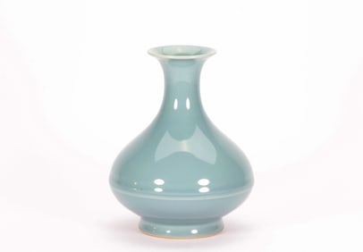 A VASE BLUE GLAZED VASE