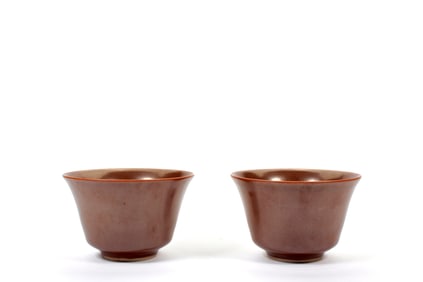 A PAIR OF BROWN-GLAZED CUPS