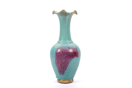 A VASE SPLASHED VASE