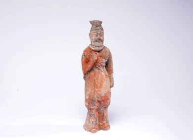 A CERAMIC SCHOLAR FIGURINE
