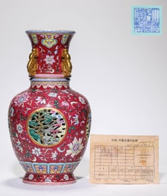 A Famille-Rose Rose-Ground 'Flower, Pine and Crane' Revolving Vase