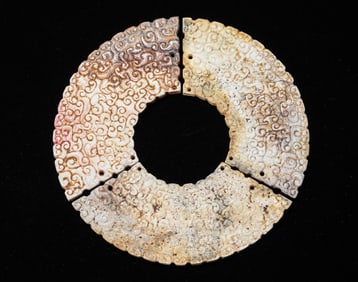A Set of Three Jade 'Dragon' Bi