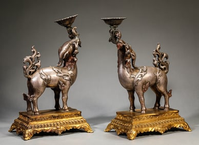 A Pair of 'Auspicious Beast' Candlesticks