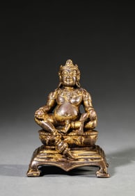 A Tibetan Pala-Style Alloy Bronze Yellow Jambhala