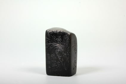 AN AGARWOOD ARCHER'S RING CARVED WITH 'FU SHOU' MOTIF