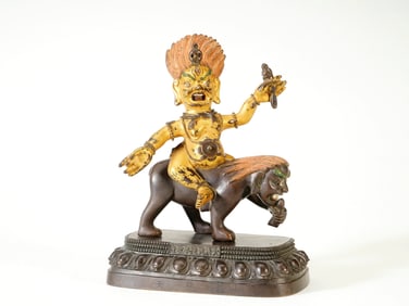 A PARTIALY GILT-LACQUERED FIGURE OF RAKSHA