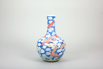 A BLUE-GROUND FAMILLE-ROSE 'CLOUD AND DRAGON' GLOBULAR VASE