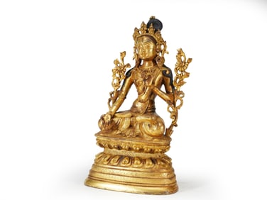 A GILT BRONZE FIGURE OF TARA