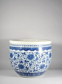 A BLUE-AND-WHITE "LOTUS-SCROLL" BRUSH POT