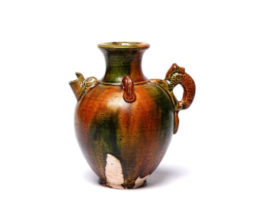 A SANCAI-GLAZED EWER WITH BEAST-HEAD SPOUT