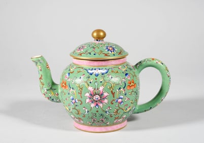 A TURQUOISE-GROUND FAMILLE ROSE INTERLOCKING FLORAL TEAPOT