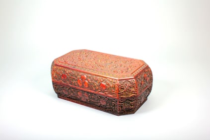 A FINE HUANGHUALI WOOD CARVED DRAGON-DECORATED BOX AND COVER