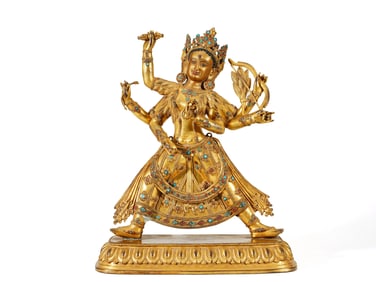 A GILT-BRONZE FIGURE OF BUDDA