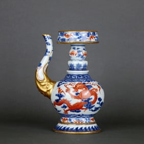 A BLUE AND WHITE IRON-RED GILT CLOUD-DRAGON-PATTERN BIMBA POT