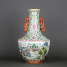A FAMILLE ROSE GREEN-GROUND LANDSCAPE-PATTERN VASE WITH HANDLES