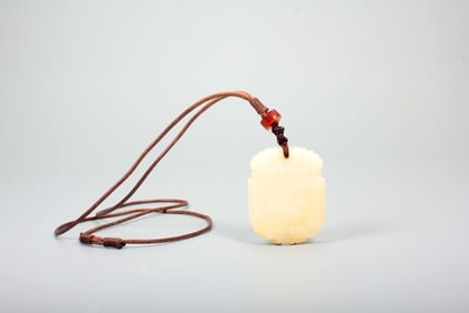 A HETIAN JADE PLAQUE WITH BEAST PLAQUE