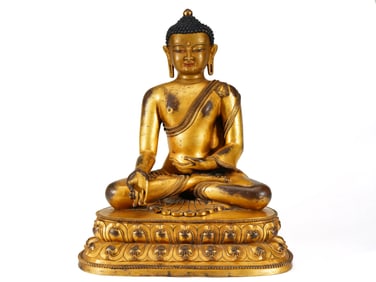 A GILT-BRONZE FIGURE OF BUDDA