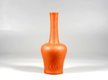 A PURPLE CLAY BELL-SHAPED VESSEL