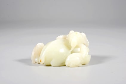 A WHITE JADE "THREE RAMS HERALD SPRING" ORNAMENT