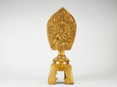 A GILT BRONZE FIGURE OF BUDDA