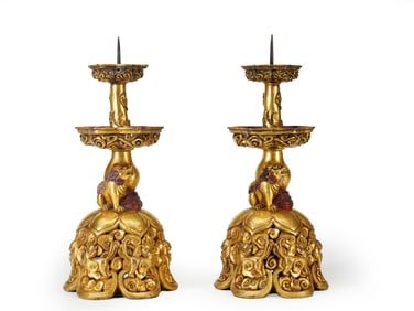 A PAIR OF GILT BRONZE FIGURE CANDLE STANDS
