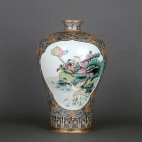 A BLACK-GROUND IRON-RED GILT PANELED FAMILLE ROSE BIRD-AND-FLOWER-PATTERN PRUNUS VASE