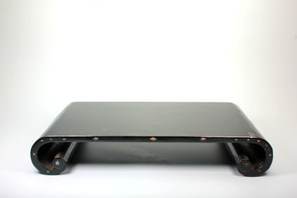 A BLACK-LACQUER SCROLL TABLE