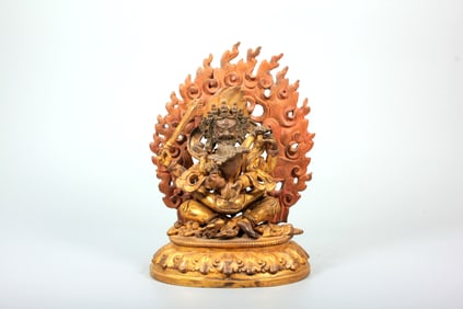 A GILT-BRONZE FIGURE OF SAMBHARA BUDDHA